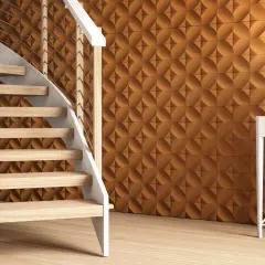 Escalera moderna y pared texturizada en tono terracota, ideal para decorar rincones dificiles con estilo y calidez.