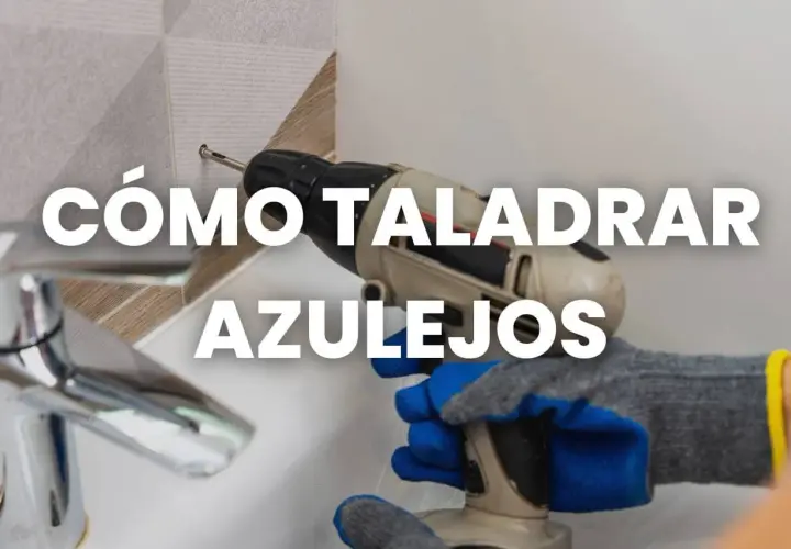 Mano con guantes usa taladro para taladrar azulejo.