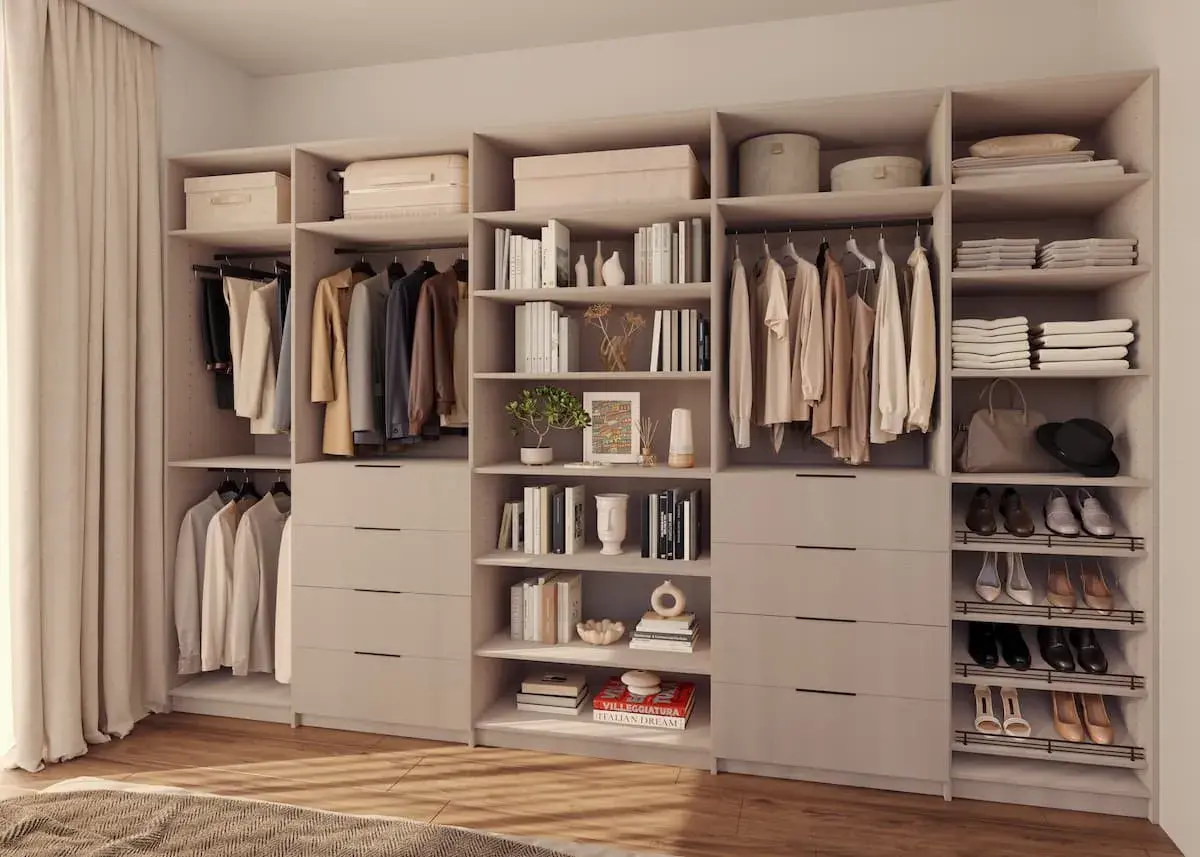 Ideas vestidor abierto: ropa colgada, cajones y estantes con libros y accesorios.