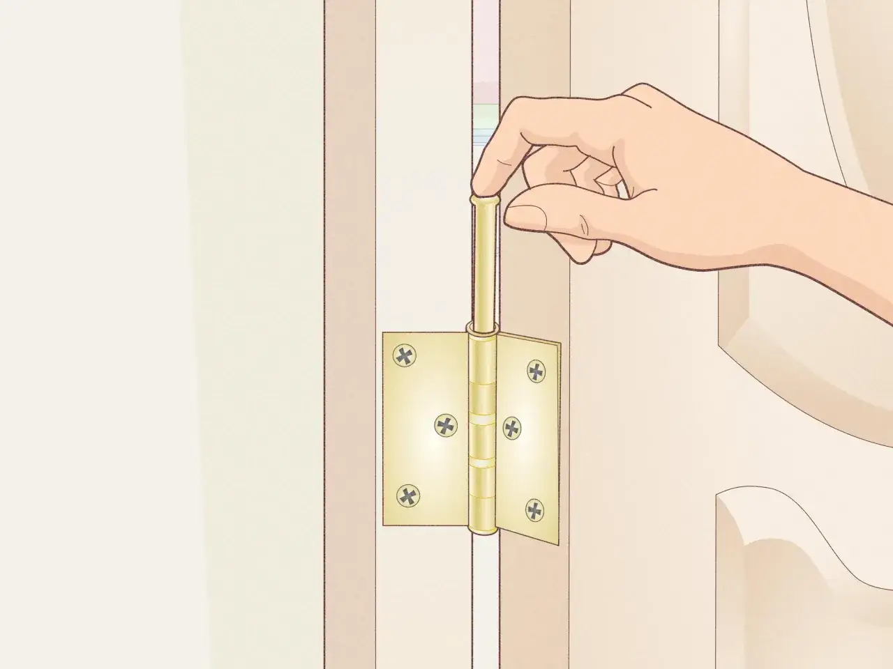 Mano insertando el pasador en una bisagra dorada para reparar puertas interiores de casa.